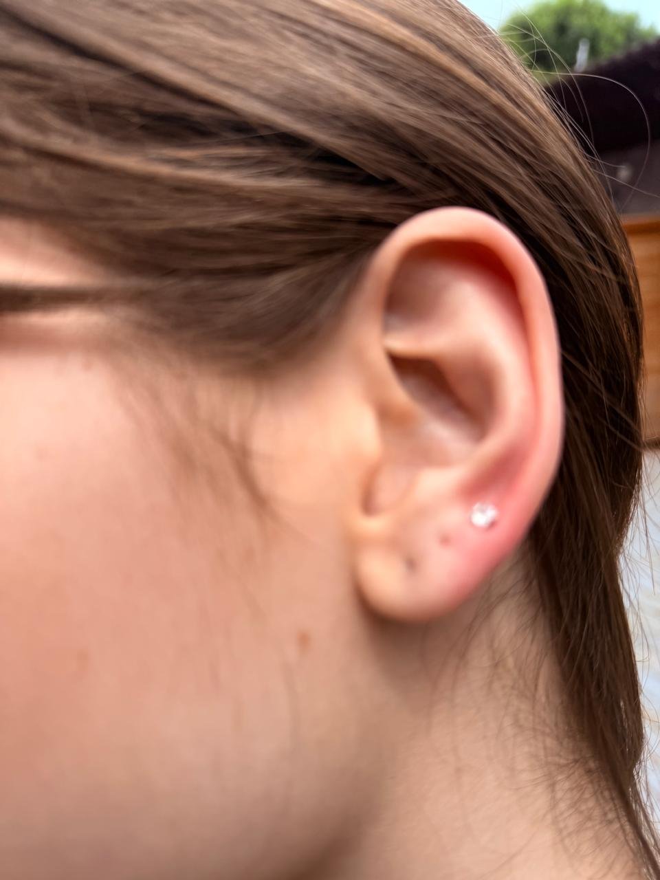 Trabalho de piercing do estúdio Paulinho Tattoo